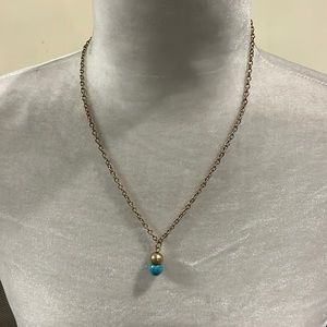 Gold tone necklace /turquoise color bead. Worn several times. Listing #7008